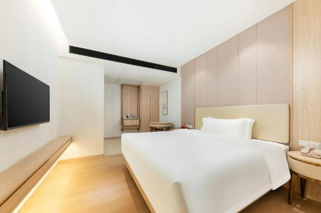 Bed in GreenTree Eastern Hotel Shenzhen Nanshan District Qianhai Free Trade Zone Lilin Metro Station