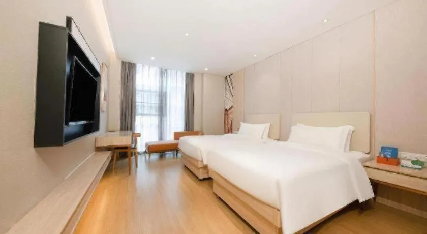 Bed in GreenTree Eastern Hotel Shenzhen Nanshan District Qianhai Free Trade Zone Lilin Metro Station