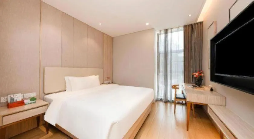 Bed in GreenTree Eastern Hotel Shenzhen Nanshan District Qianhai Free Trade Zone Lilin Metro Station