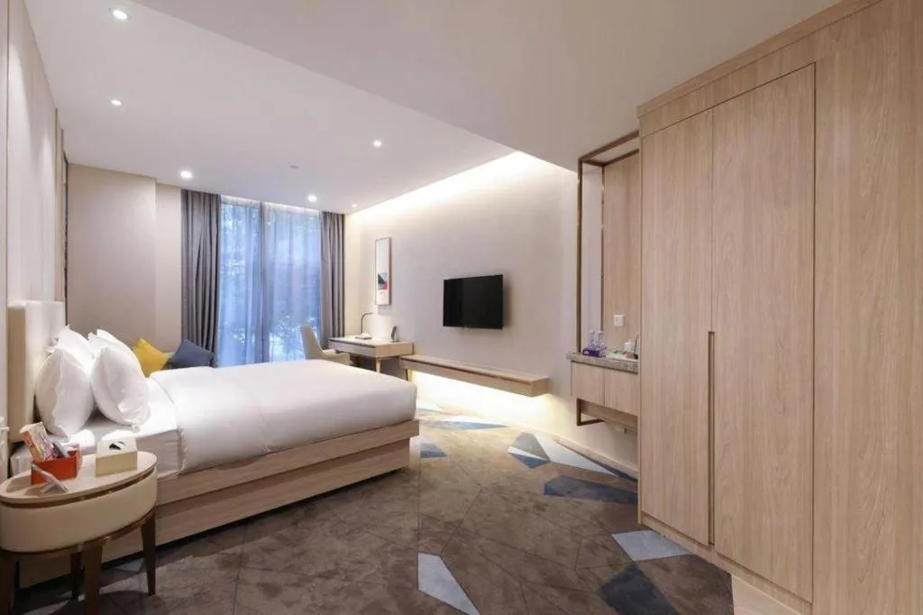 Bed in GreenTree Eastern Hotel Shenzhen Nanshan District Qianhai Free Trade Zone Lilin Metro Station