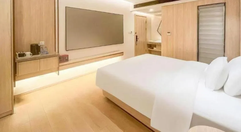Bed in GreenTree Eastern Hotel Shenzhen Nanshan District Qianhai Free Trade Zone Lilin Metro Station