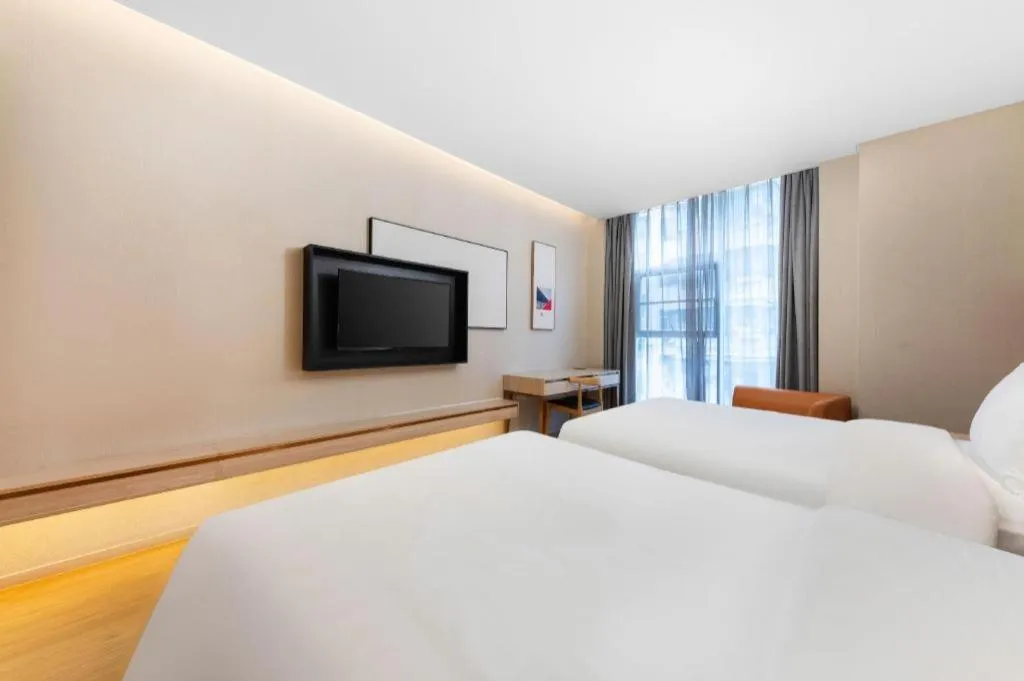 Bed in GreenTree Eastern Hotel Shenzhen Nanshan District Qianhai Free Trade Zone Lilin Metro Station