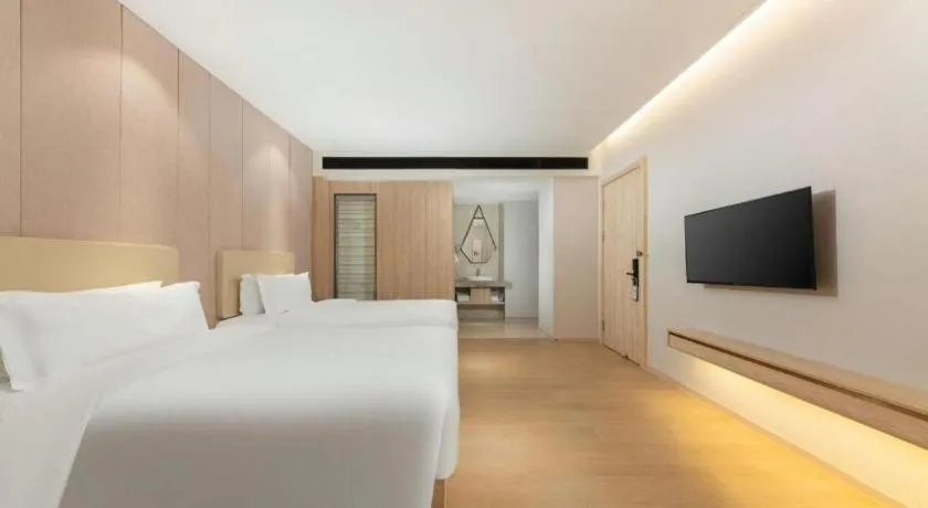 Bed in GreenTree Eastern Hotel Shenzhen Nanshan District Qianhai Free Trade Zone Lilin Metro Station