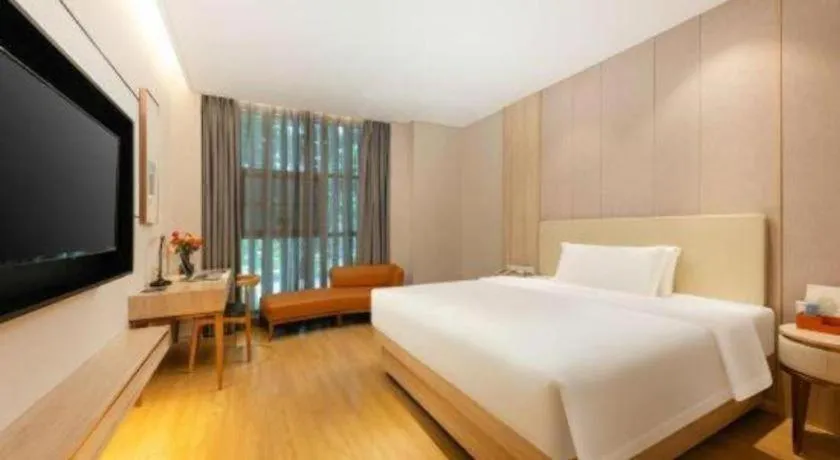 Bed in GreenTree Eastern Hotel Shenzhen Nanshan District Qianhai Free Trade Zone Lilin Metro Station