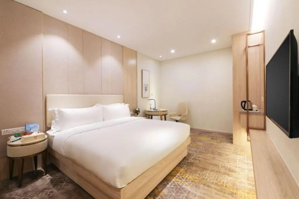 Bed in GreenTree Eastern Hotel Shenzhen Nanshan District Qianhai Free Trade Zone Lilin Metro Station