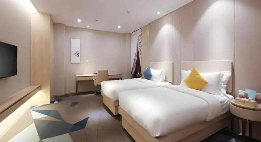 Bed in GreenTree Eastern Hotel Shenzhen Nanshan District Qianhai Free Trade Zone Lilin Metro Station