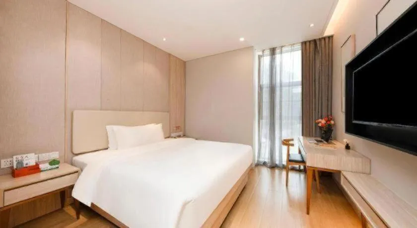 Bed in GreenTree Eastern Hotel Shenzhen Nanshan District Qianhai Free Trade Zone Lilin Metro Station