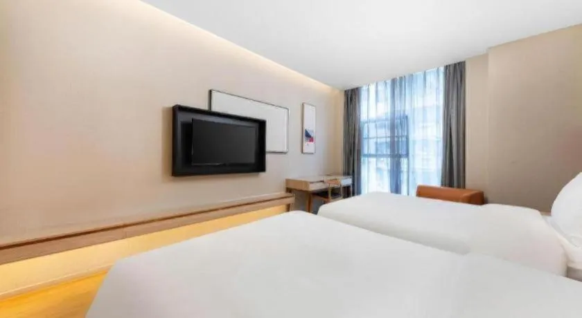 Bed in GreenTree Eastern Hotel Shenzhen Nanshan District Qianhai Free Trade Zone Lilin Metro Station