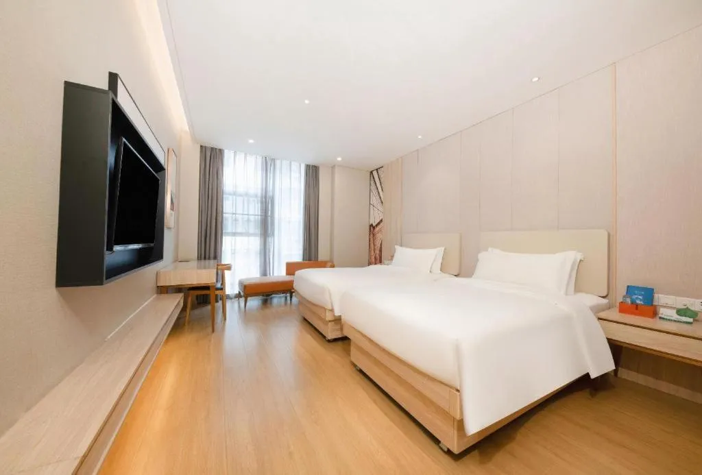 Bed in GreenTree Eastern Hotel Shenzhen Nanshan District Qianhai Free Trade Zone Lilin Metro Station