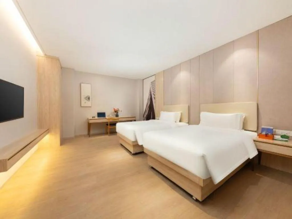 Bed in GreenTree Eastern Hotel Shenzhen Nanshan District Qianhai Free Trade Zone Lilin Metro Station