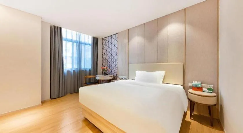 Bed in GreenTree Eastern Hotel Shenzhen Nanshan District Qianhai Free Trade Zone Lilin Metro Station