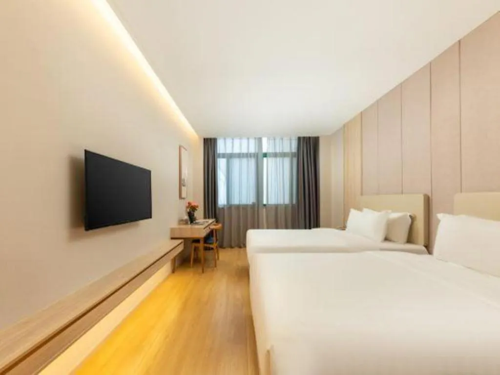 Bed in GreenTree Eastern Hotel Shenzhen Nanshan District Qianhai Free Trade Zone Lilin Metro Station