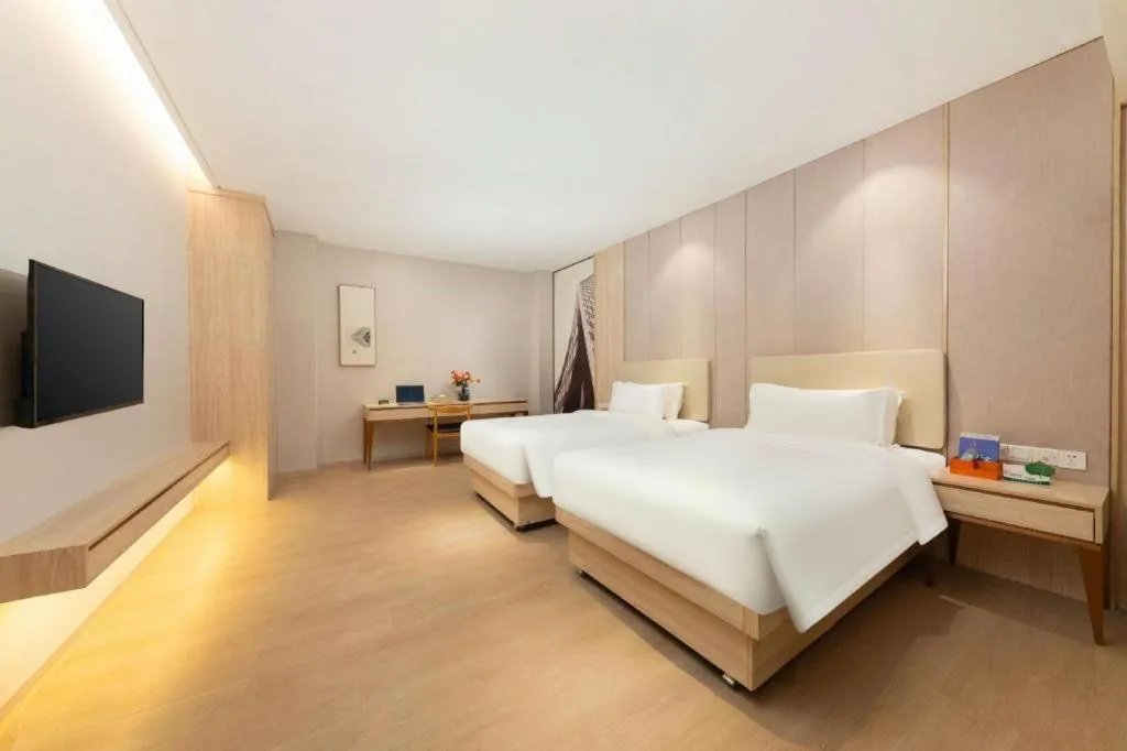 Bed in GreenTree Eastern Hotel Shenzhen Nanshan District Qianhai Free Trade Zone Lilin Metro Station