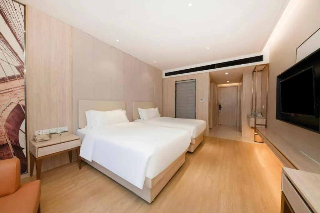 Bed in GreenTree Eastern Hotel Shenzhen Nanshan District Qianhai Free Trade Zone Lilin Metro Station