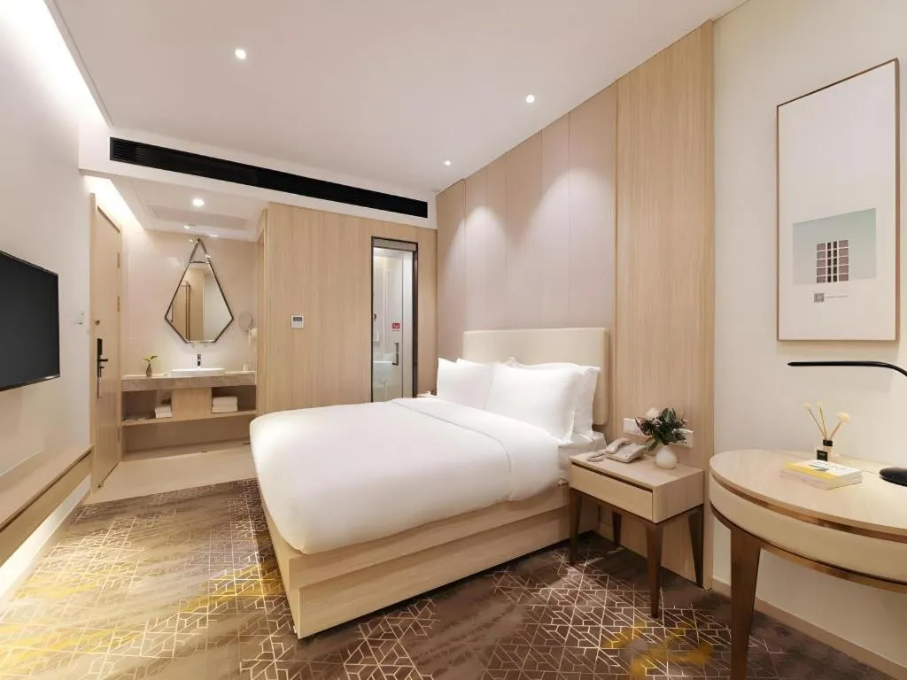 Bed in GreenTree Eastern Hotel Shenzhen Nanshan District Qianhai Free Trade Zone Lilin Metro Station