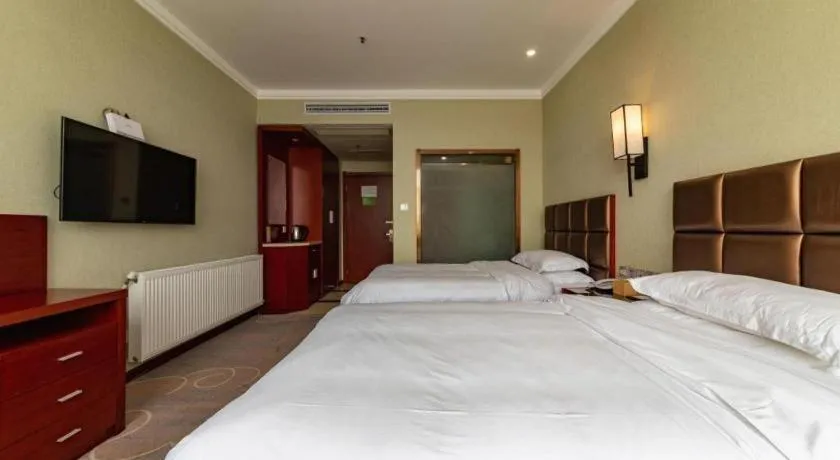 Bed in GreenTree Alliance Hotel Yancheng Engineering College Dayangwan Scenic Area