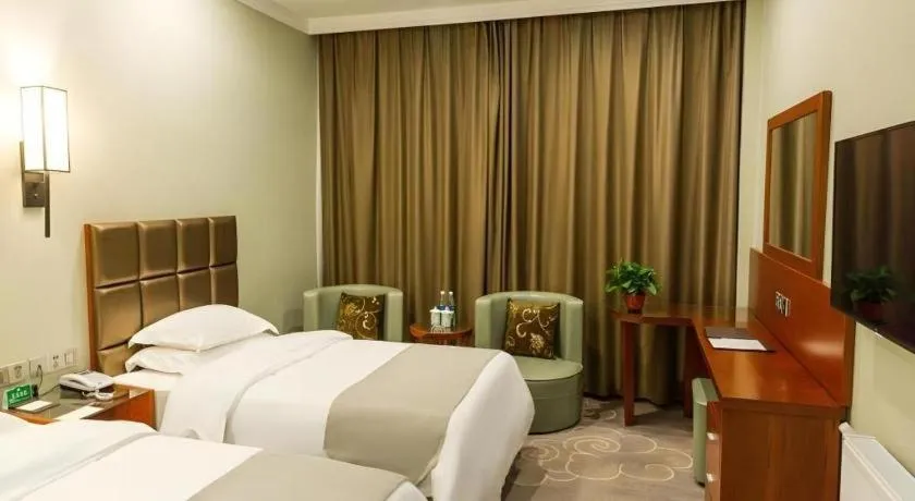 Bed in GreenTree Alliance Hotel Yancheng Engineering College Dayangwan Scenic Area
