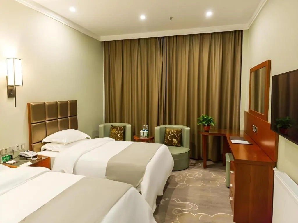 Bed in GreenTree Alliance Hotel Yancheng Engineering College Dayangwan Scenic Area