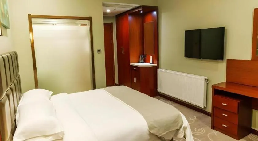 Bed in GreenTree Alliance Hotel Yancheng Engineering College Dayangwan Scenic Area