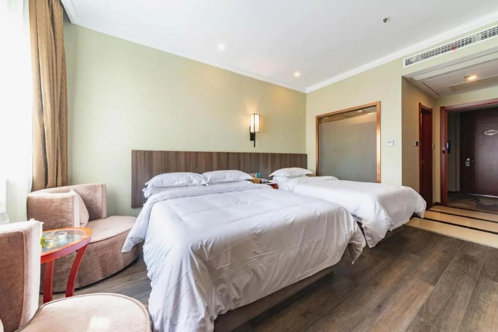 Bed in GreenTree Alliance Hotel Yancheng Engineering College Dayangwan Scenic Area