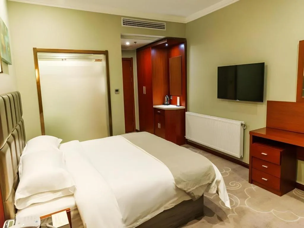 Bed in GreenTree Alliance Hotel Yancheng Engineering College Dayangwan Scenic Area