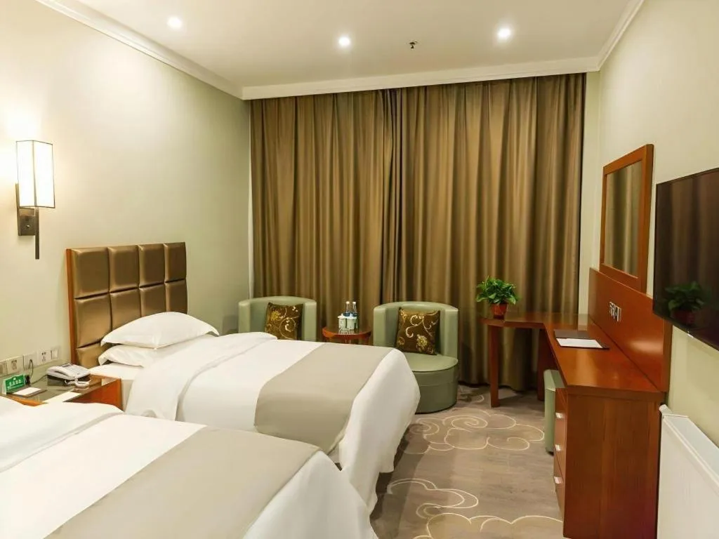 Bed in GreenTree Alliance Hotel Yancheng Engineering College Dayangwan Scenic Area