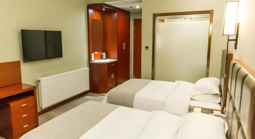 Bed in GreenTree Alliance Hotel Yancheng Engineering College Dayangwan Scenic Area