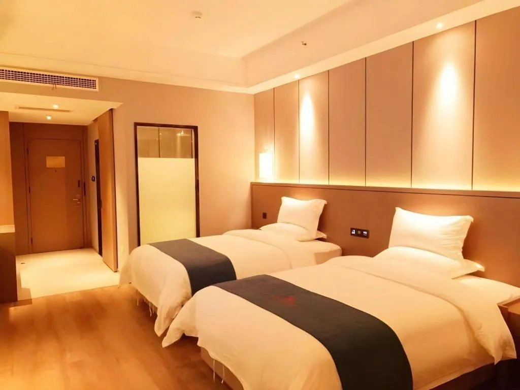 Bed in GreenTree Eastern Hotel Changge Yiwu City