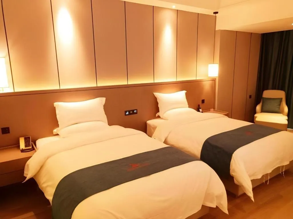 Bed in GreenTree Eastern Hotel Changge Yiwu City