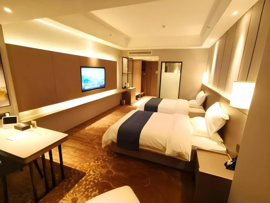 Bed in GreenTree Eastern Hotel Changge Yiwu City