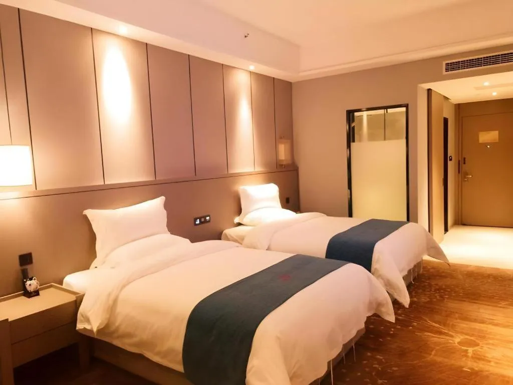 Bed in GreenTree Eastern Hotel Changge Yiwu City