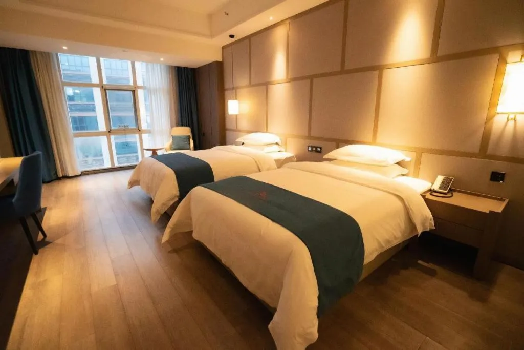 Bed in GreenTree Eastern Hotel Changge Yiwu City