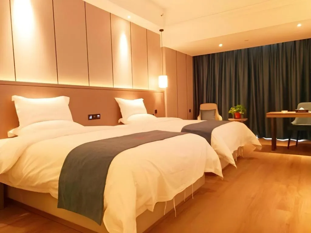 Bed in GreenTree Eastern Hotel Changge Yiwu City