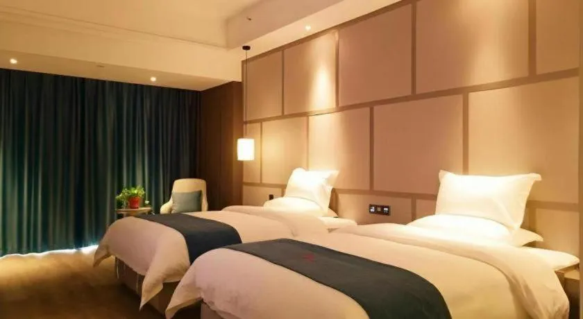 Bed in GreenTree Eastern Hotel Changge Yiwu City