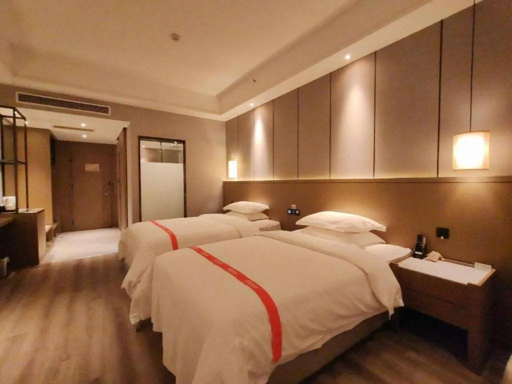 Bed in GreenTree Eastern Hotel Changge Yiwu City