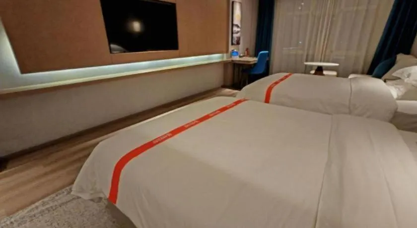 Bed in GreenTree Eastern Hotel Changge Yiwu City