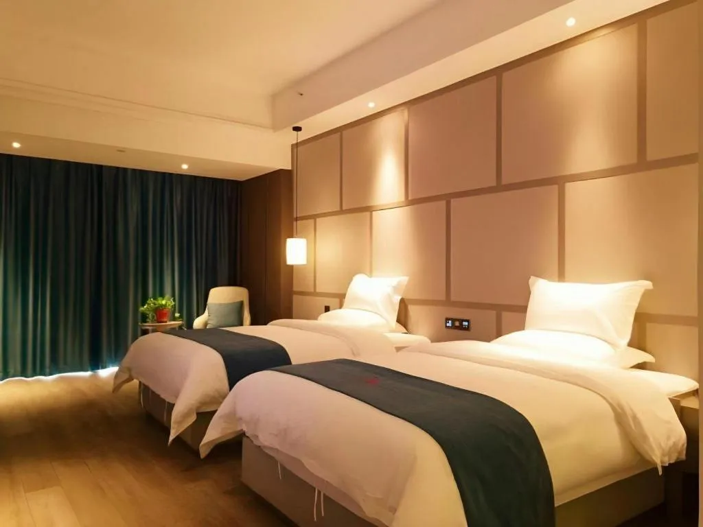 Bed in GreenTree Eastern Hotel Changge Yiwu City