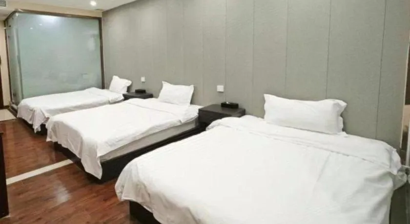Bed in Shell Hotel Huainan Shou County Passenger Station Yaohai Grand Market