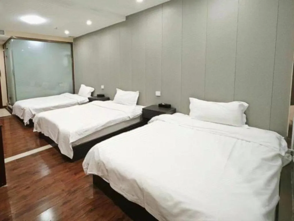 Bed in Shell Hotel Huainan Shou County Passenger Station Yaohai Grand Market