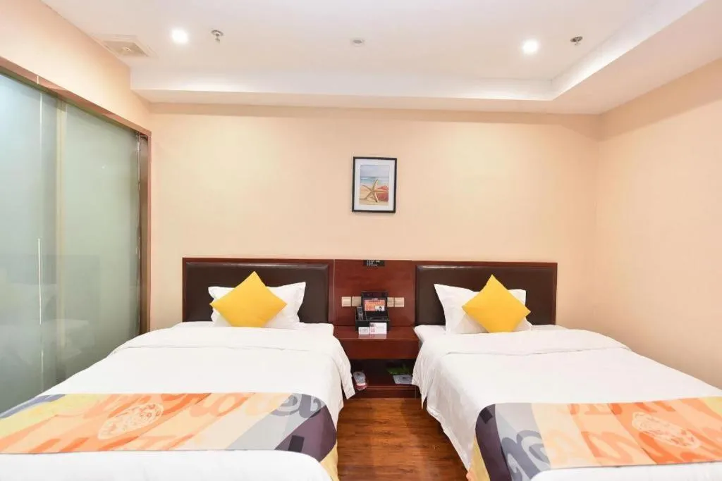 Bed in Shell Hotel Huainan Shou County Passenger Station Yaohai Grand Market