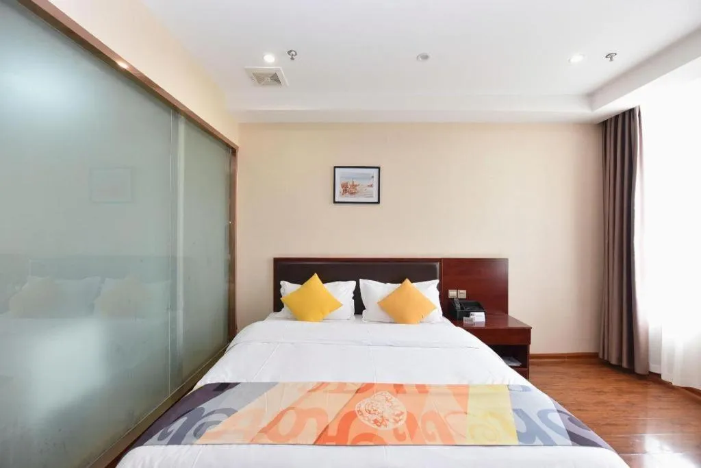 Bed in Shell Hotel Huainan Shou County Passenger Station Yaohai Grand Market