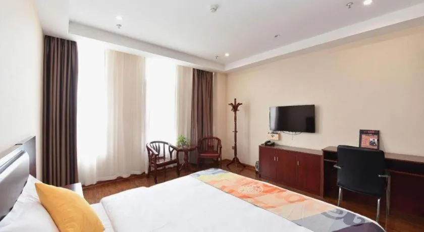 Bed in Shell Hotel Huainan Shou County Passenger Station Yaohai Grand Market