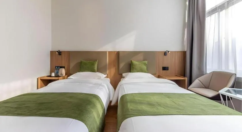 Bed in GreenTree Inn Express Lanzhou West Passenger Station Lanzhou Center