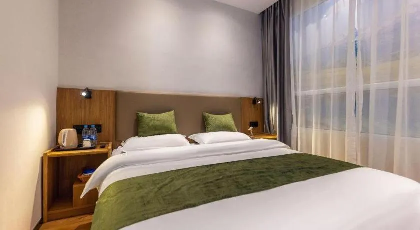 Bed in GreenTree Inn Express Lanzhou West Passenger Station Lanzhou Center