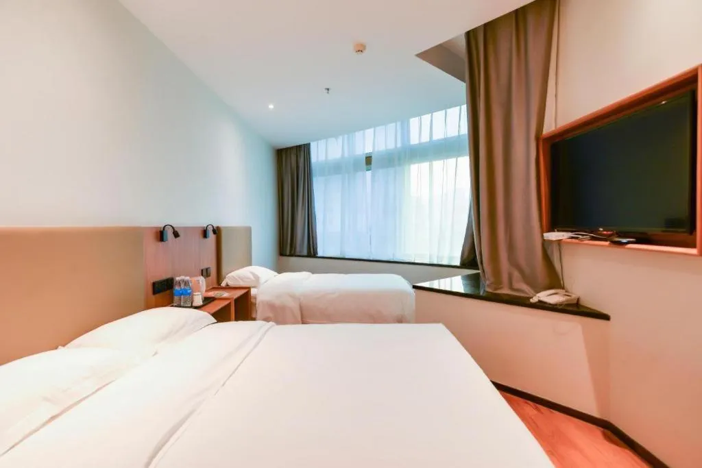 Bed in GreenTree Inn Express Lanzhou West Passenger Station Lanzhou Center