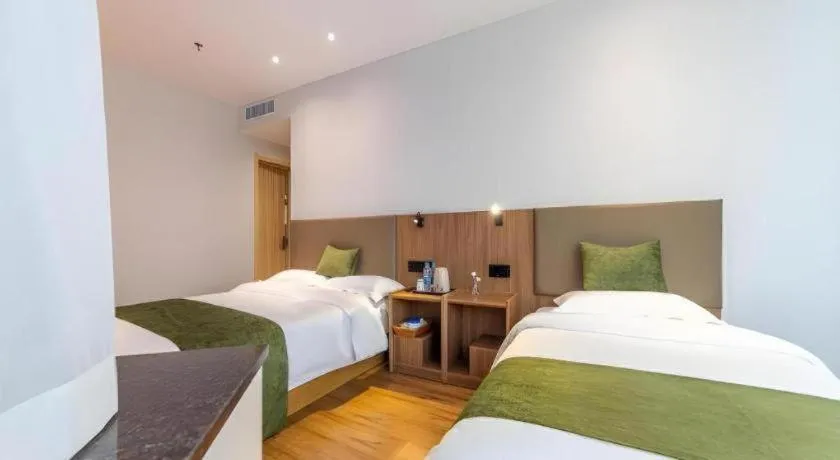 Bed in GreenTree Inn Express Lanzhou West Passenger Station Lanzhou Center