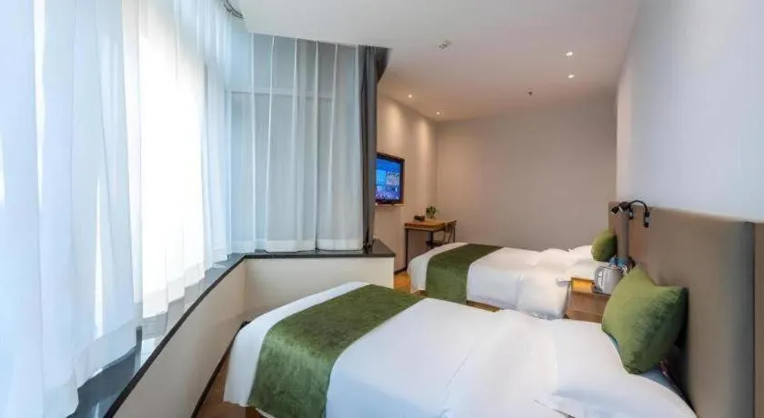 Bed in GreenTree Inn Express Lanzhou West Passenger Station Lanzhou Center