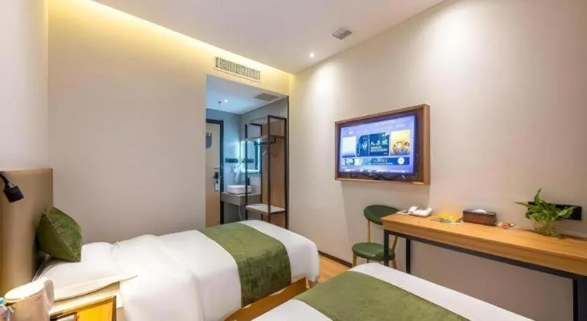 Bed in GreenTree Inn Express Lanzhou West Passenger Station Lanzhou Center