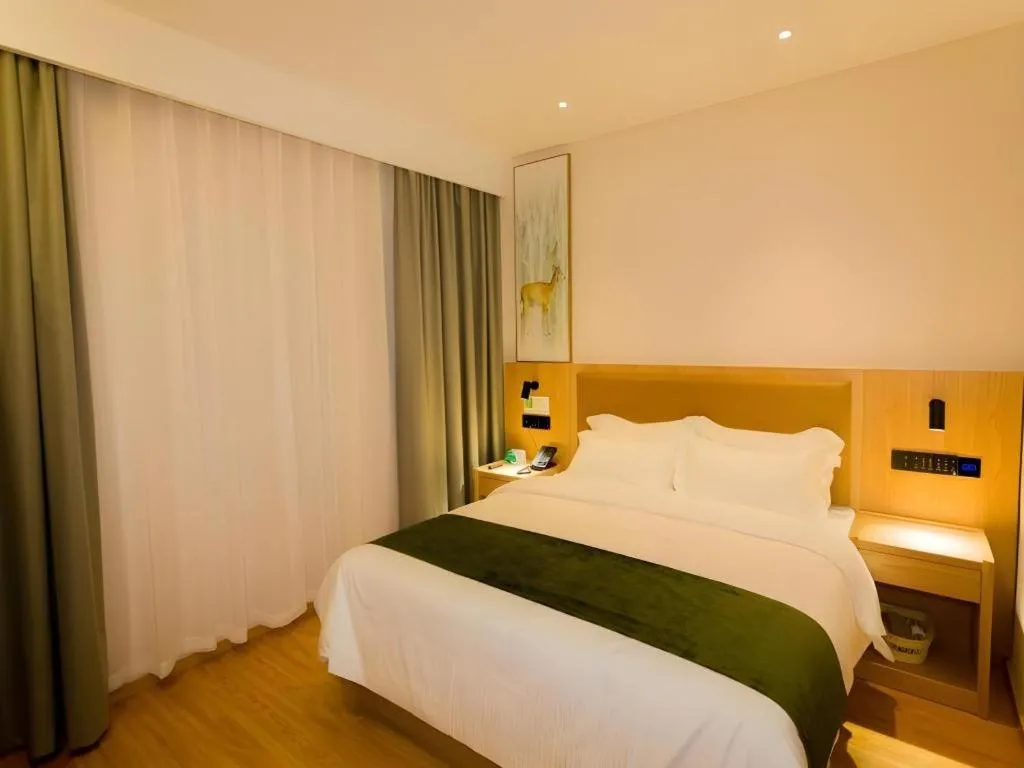 Bed in GreenTree Inn Express Henan Xinyang Huaibin County