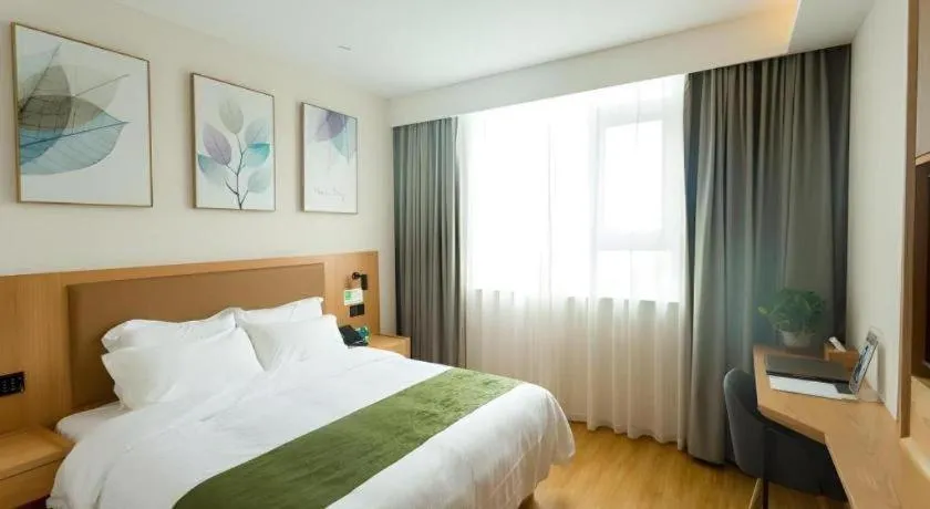 Bed in GreenTree Inn Express Henan Xinyang Huaibin County
